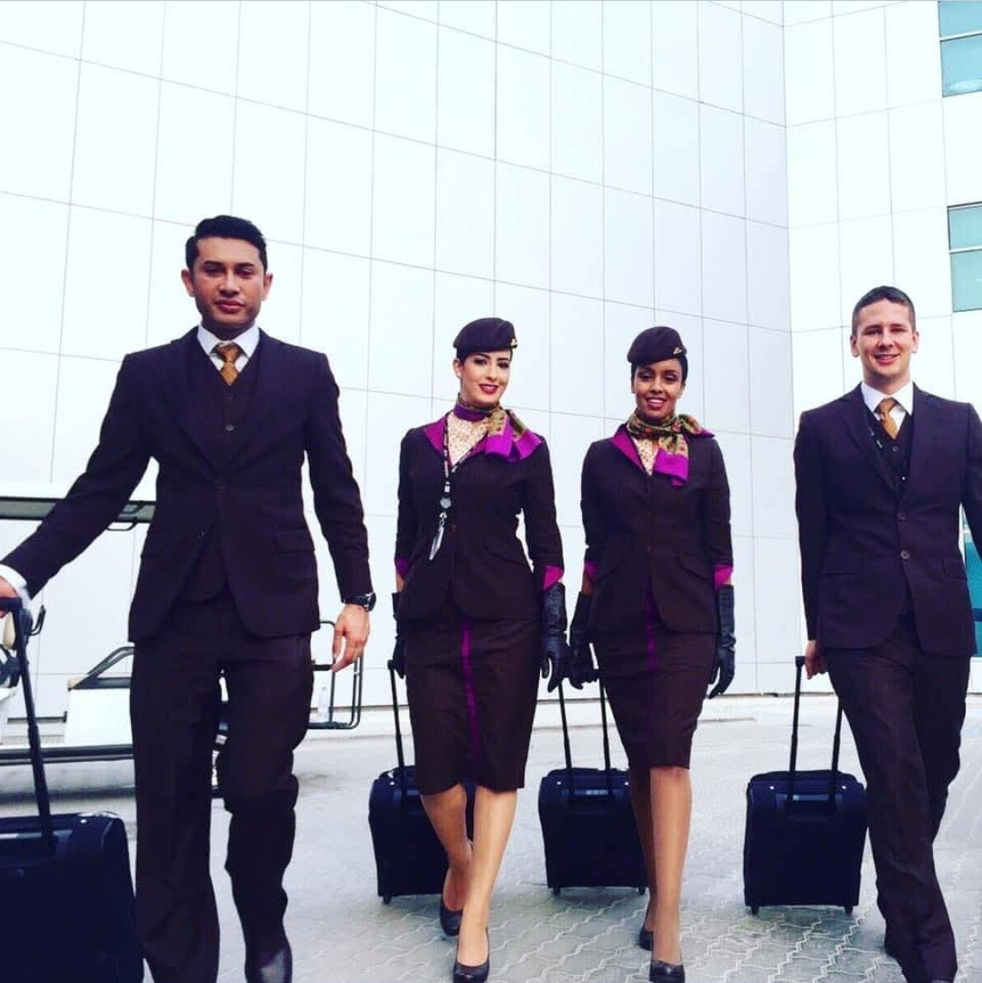 Coach Soukaina with cabin crew in uniform